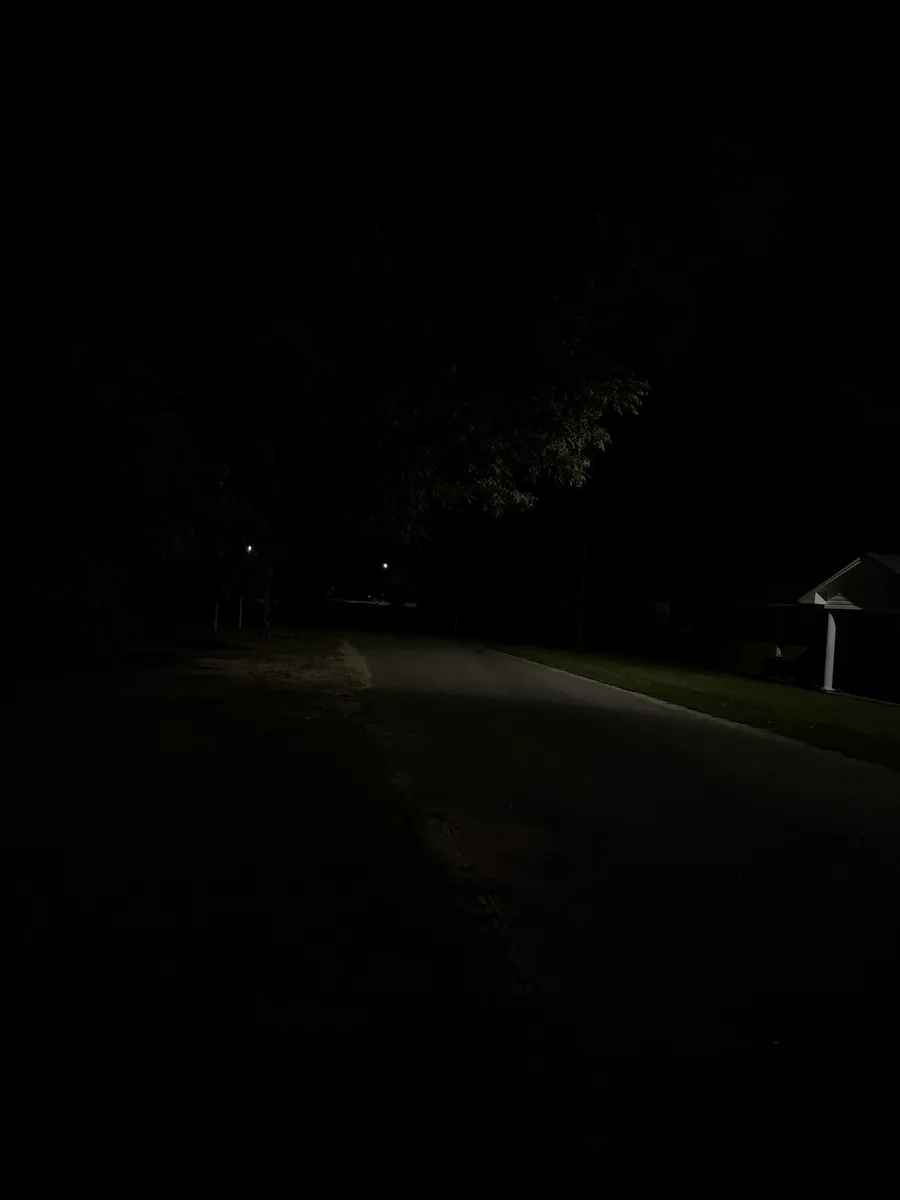 A Darlington County residential road with sparse nighttime lighting